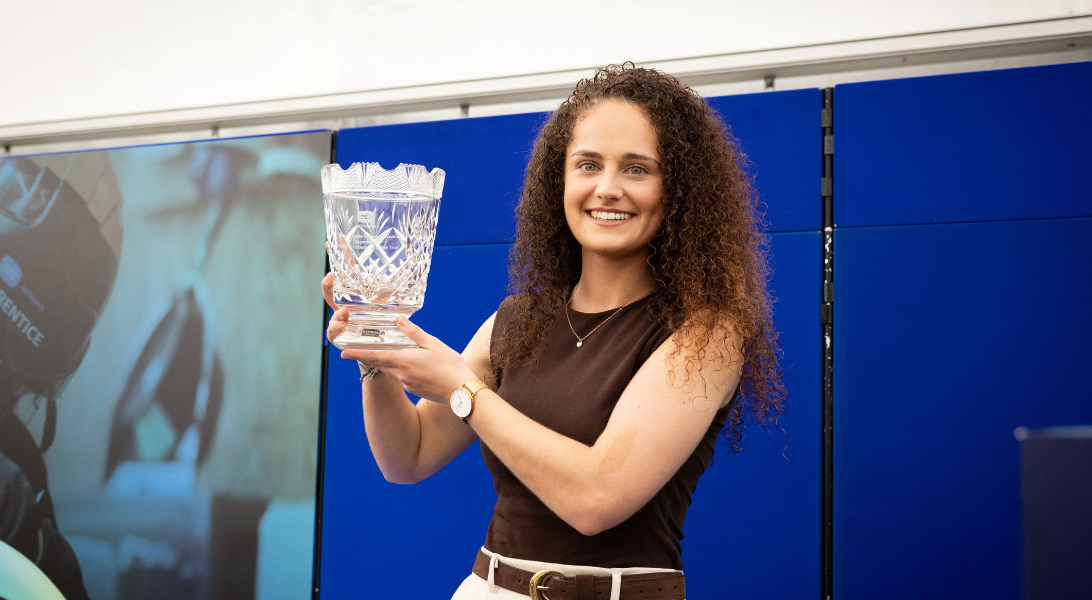 Network Technician Apprentice of the Year winner holding trophy