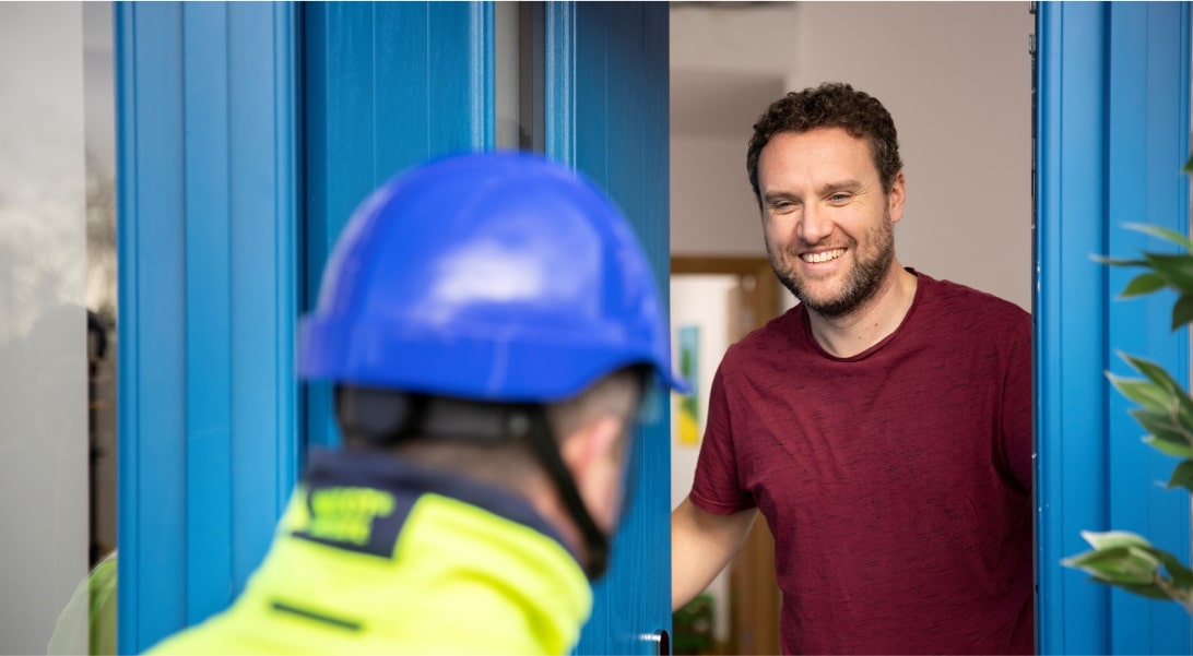 Customer at home welcoming ESB Networks technician