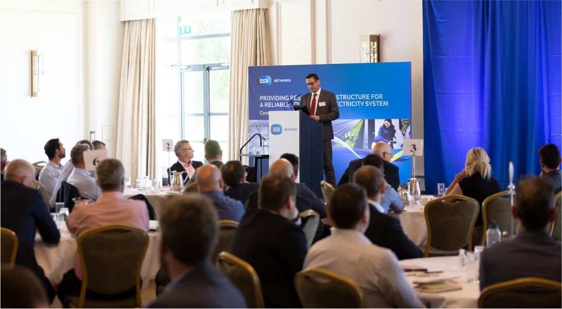 Speaker in front of an audience at ESB Networks conference