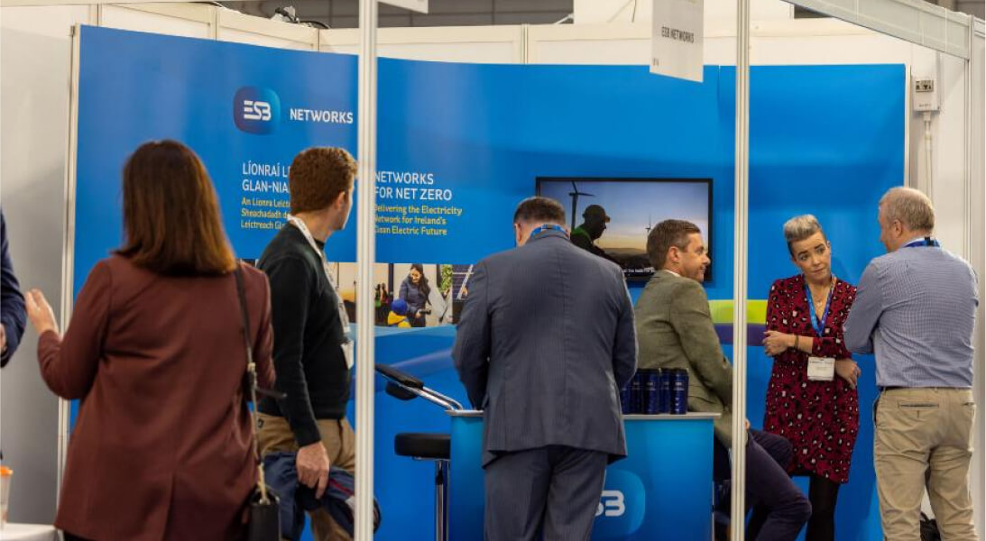 Group of people chatting at a stakeholder event