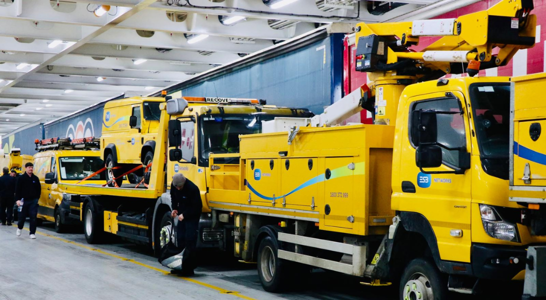 ESB Networks yellow vans and trucks in depot