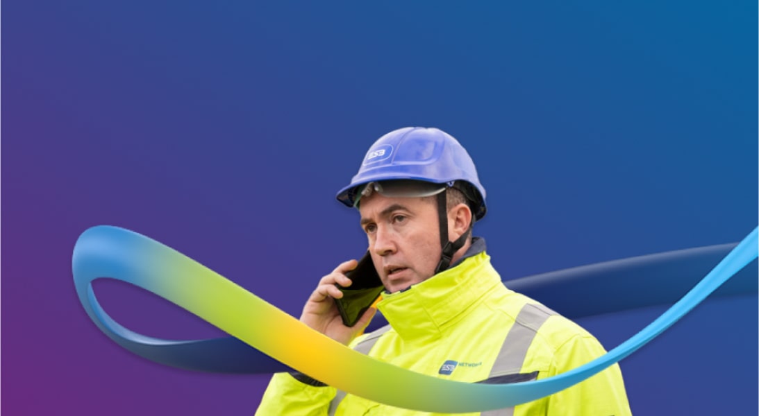 A technician engaged in a phone conversation