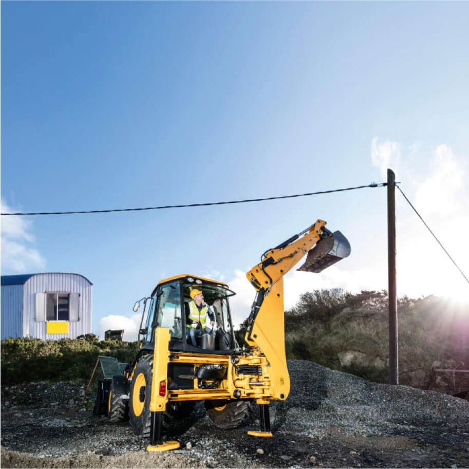 Technician working near overhead electricity wires