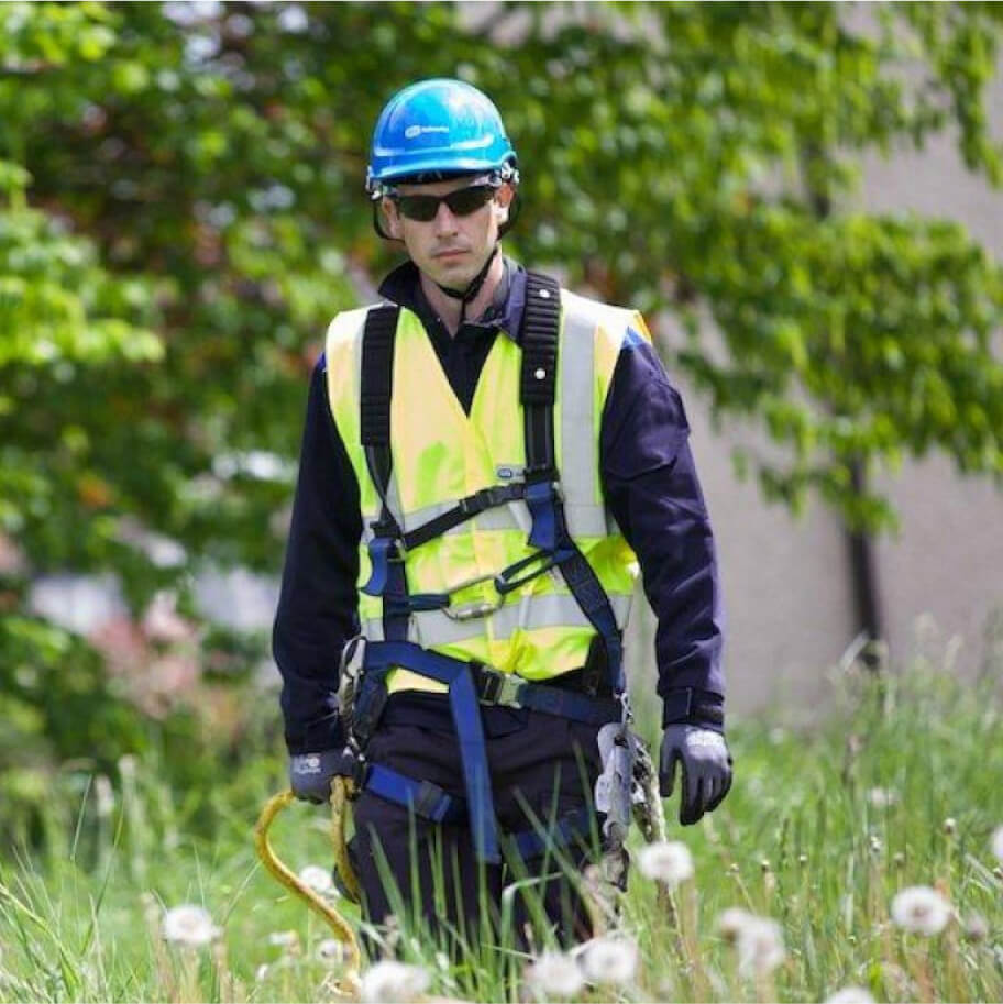 Technician walking on a farm land
