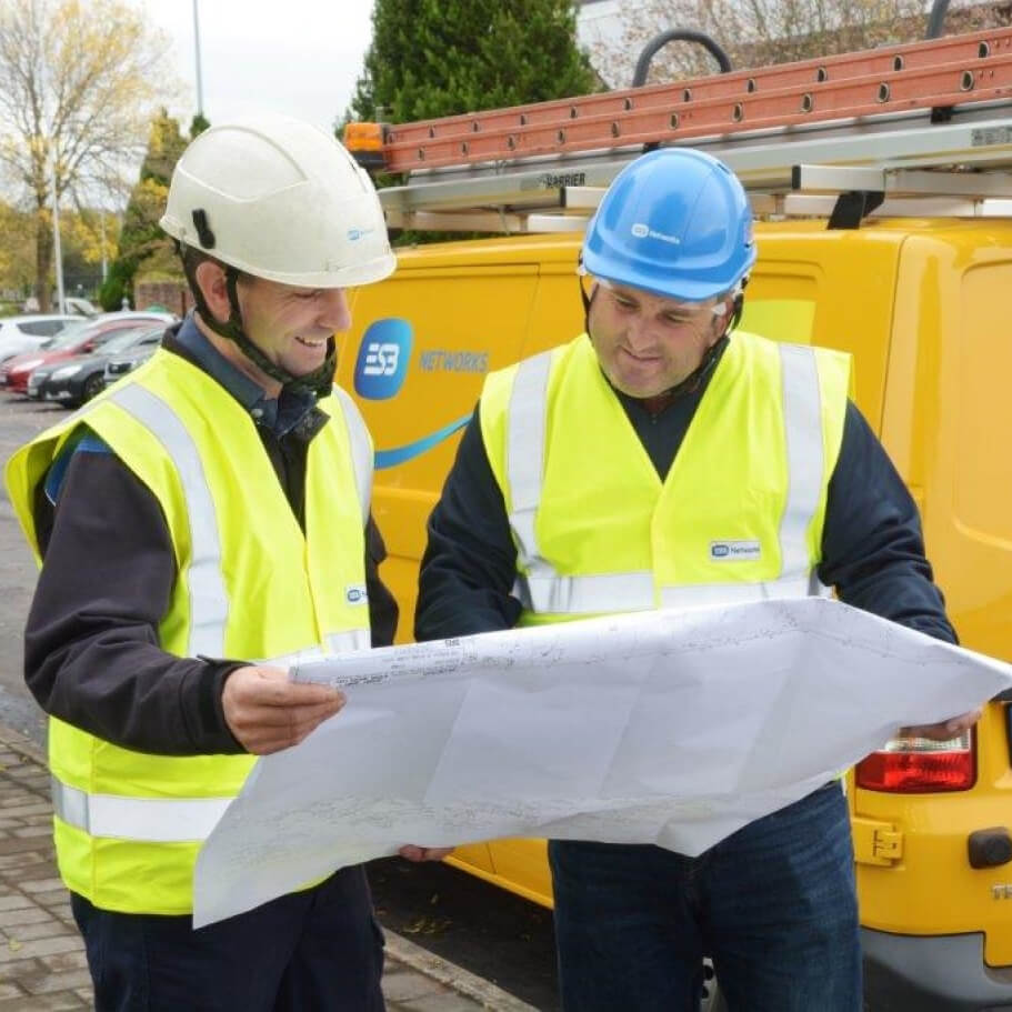Technicians looking at a map