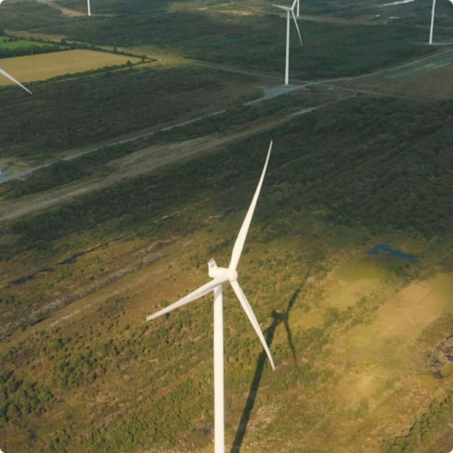 Wind turbine in a field